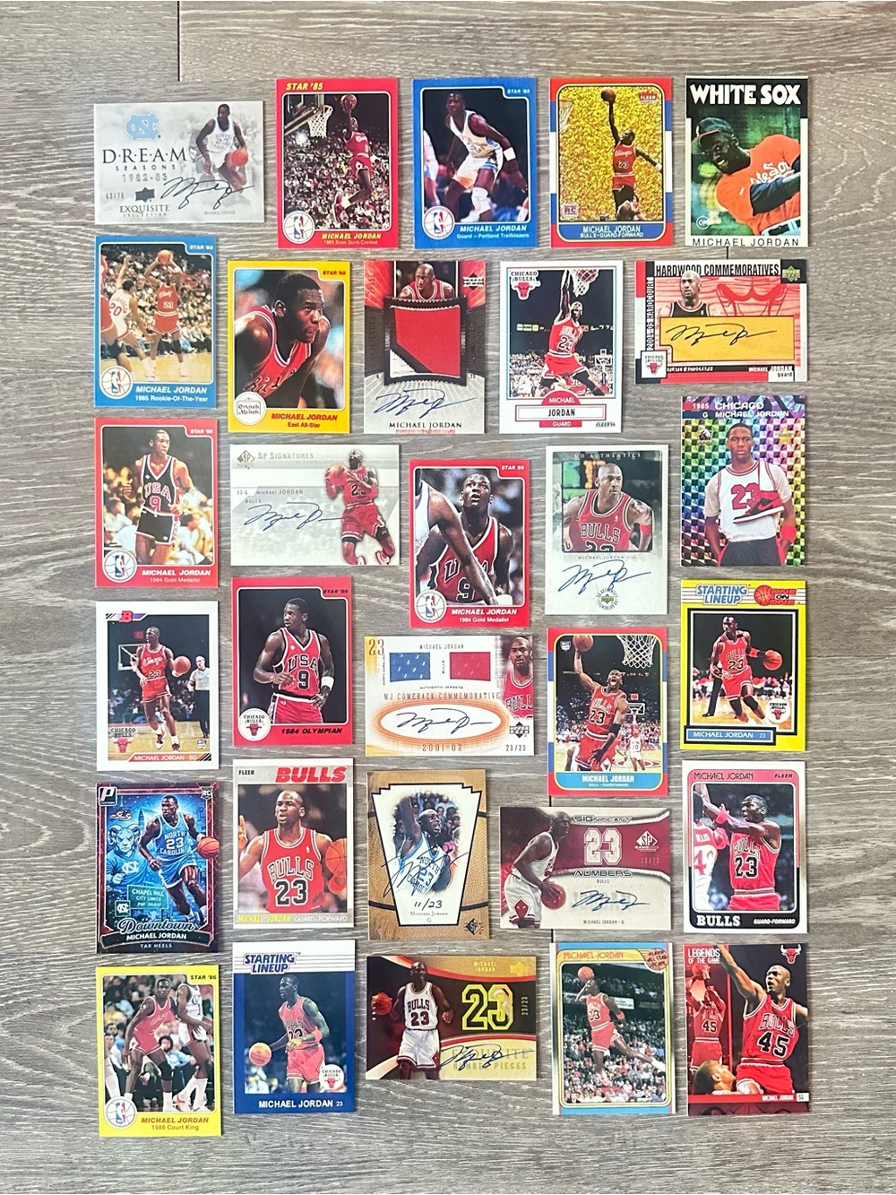 Michael Jordan Signed Rookie Lot of (30) Star Fleer Upper Deck Novelty Cards.